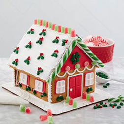 Mistletoe Draped Gingerbread House